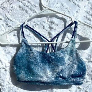 blue and navy patterned ivivva sports bra